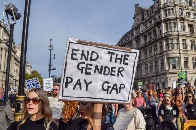 Protesters in London are calling for an end to the gender pay gap.
