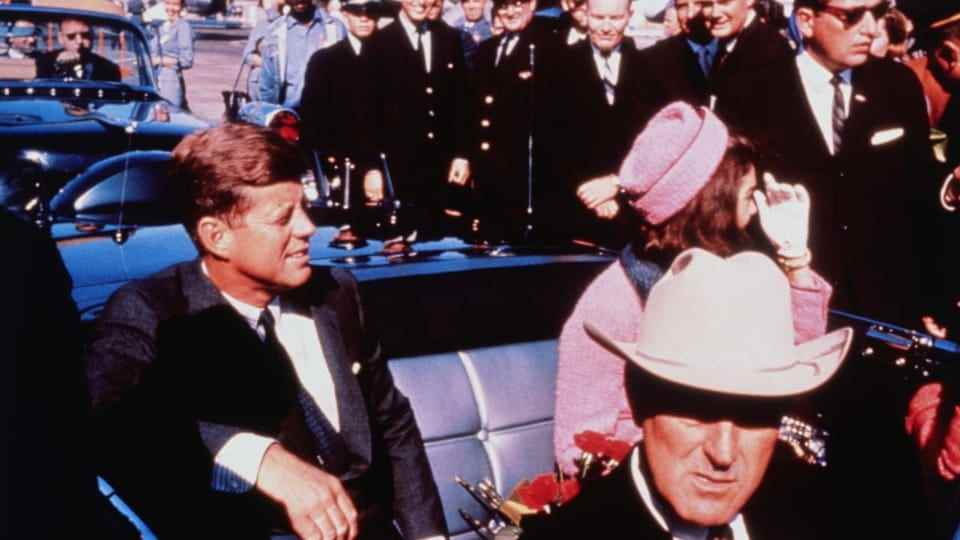 US President John F. Kennedy and First Lady Jacqueline Kennedy in assassination car