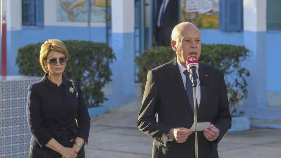 Tunisia's President Kais Saied delivers a statement after voting in the general elections in Tunis. 