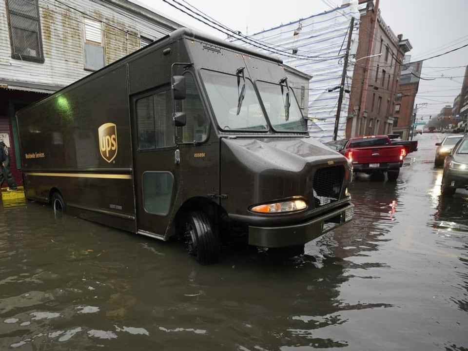 A truck on a flooded road