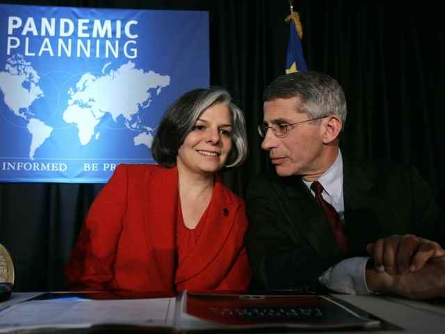 Julie Gerberding (left) from the Centers for Disease Control and Prevention and Anthony Fauci