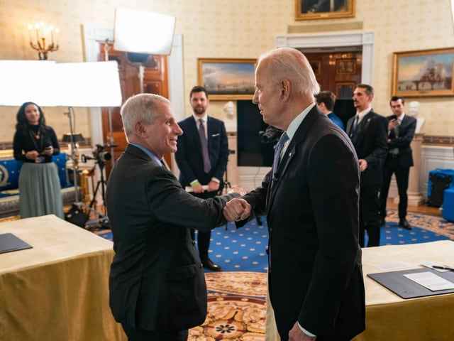 Anthony Fauci (left) and Joe Biden in the White House