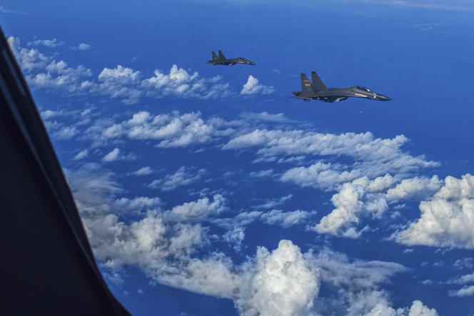 In this photo released by Xinhua News Agency, fighter jets from the Chinese People's Liberation Army's Eastern Theater of Operations conduct training exercises near the island of Taiwan on Aug. 8, 2022. 