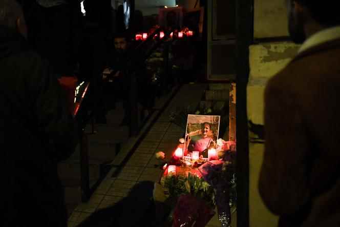 Candles were placed in front of a photograph of Emine Kara, one of the victims of the December 23, 2022 shooting outside a Kurdish cultural center in Paris.