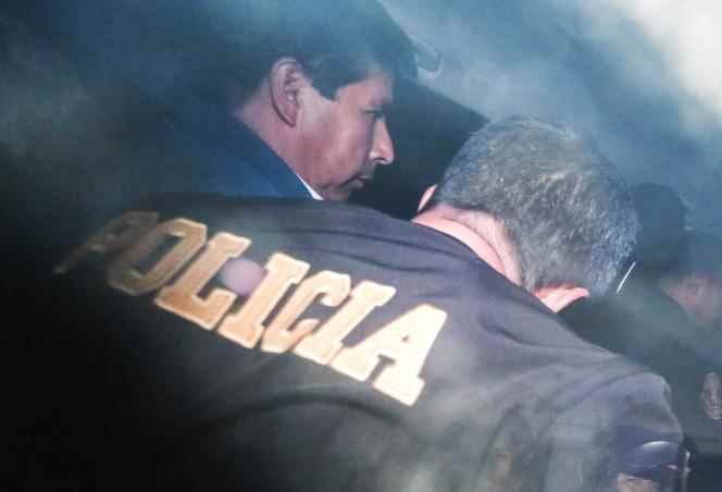 Pedro Castillo deposed and escorted by police to a police station in Lima, Peru, on December 7, 2022.
