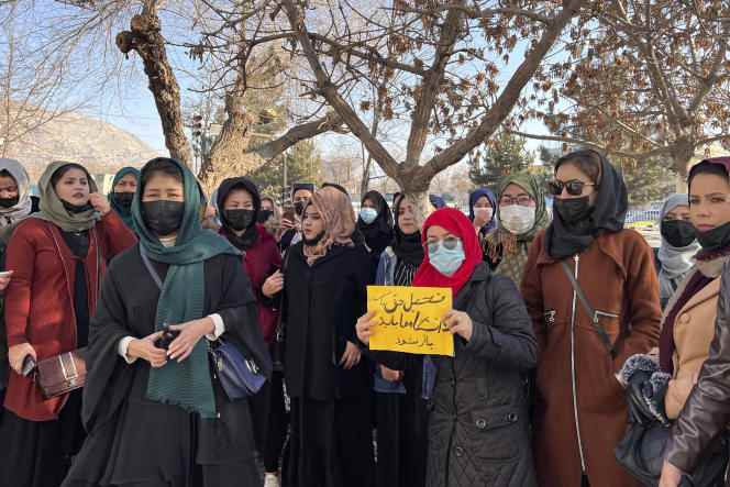 Afghan women demonstrate against the ban on university education for women, Thursday, December 22, 2022, in Kabul.