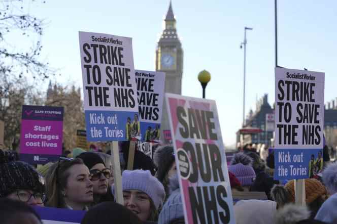 Nurses demonstrate outside St Thomas' Hospital, London, Thursday, December 15, 2022. 