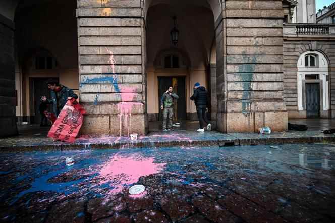 Police quickly arrived on the scene – where jets of bright pink, electric blue and turquoise paint had splashed the sidewalk – and the activists were arrested on Wednesday, December 7, 2022, at La Scala in Milan.