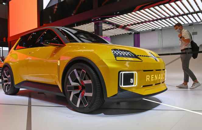 A visitor looks at the new electric Renault R5, presented at the Munich Mobility Show (Germany), September 7, 2021. A nod to one of France's iconic models of the 