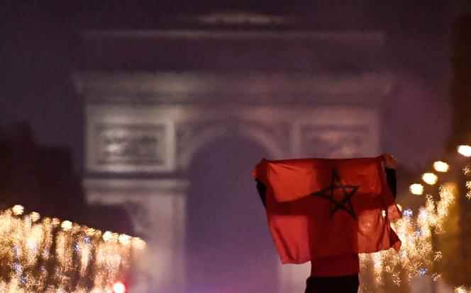A Moroccan supporter on the Champs-Elysée in Paris on December 6, 2022.
