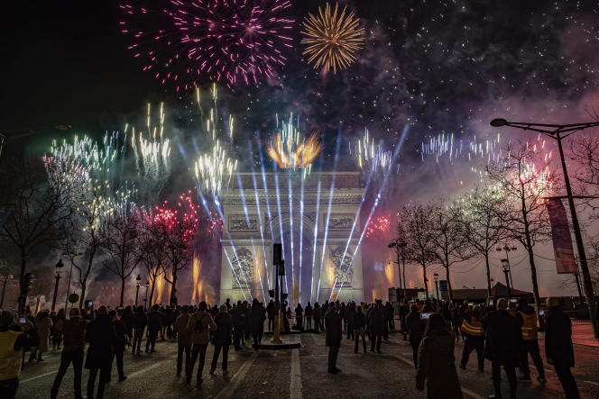 The new year was celebrated with a sound and light show and fireworks around the Arc de Triomphe on Sunday January 1, 2023. 