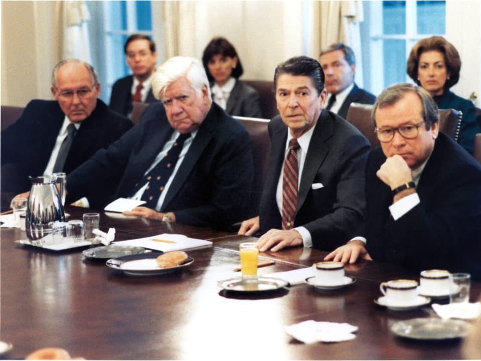 White House meeting in the 1980s.  Several representatives gathered at the table.