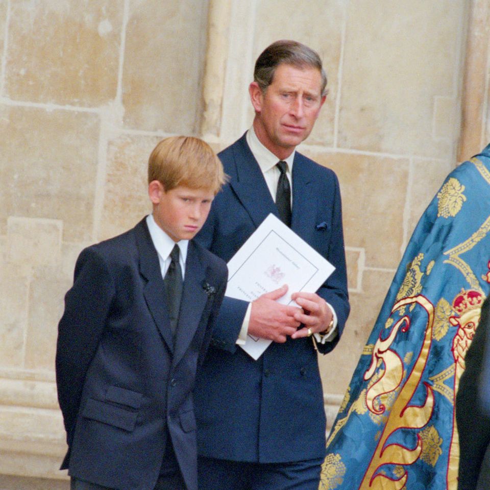 Prince Harry and then Prince Charles at Princess Diana's funeral on September 6, 1997 in London.