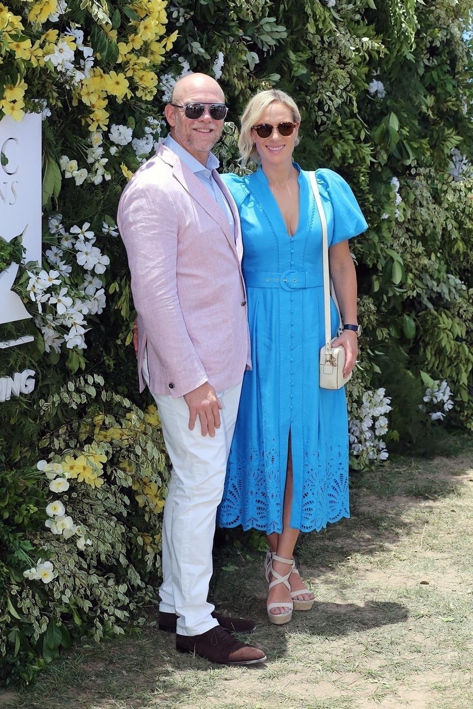 glasses on!  Mike and Zara Tindall protect themselves from the sun's rays in Australia. 