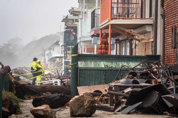 In the village of Aptos, the storm destroyed houses on the coast.  On Monday, workers began cleaning up.