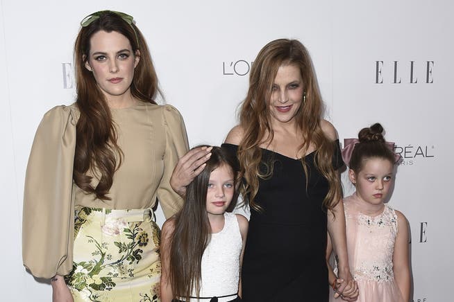 Lisa Marie Presley, second from right, her daughter Riley Keough, left, and their twin daughters Finley Lockwood and Harper Lockwood on October 16, 2017, in Los Angeles.