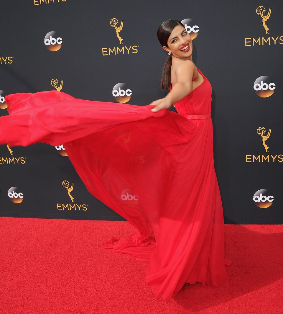 Priyanka Chopra cuts a fine figure at the Emmys in a red Jason Wu dress. 