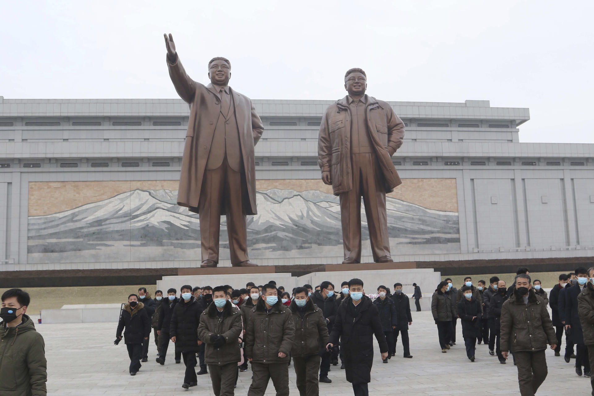 North Koreans pay their respects to former leaders Kim Il-sung and Kim Jong-il, on Mansu Hill, in Pyongyang, North Korea, January 22, 2023.