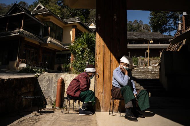 Patients who have contracted Covid-19 wait at a clinic in Wengji, a village in southern China's Yunnan province, Jan 11, 2023.