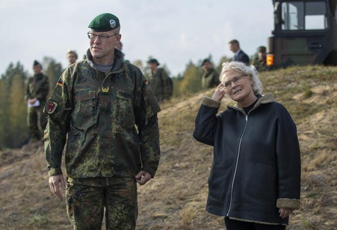 Brigadier General Christian Nawrat, commander of the 41st Mechanized Infantry Brigade of the Bundeswehr, and Christine Lambrecht, German Defense Minister, during maneuvers in Gaiziunai, Lithuania, on October 8, 2022.