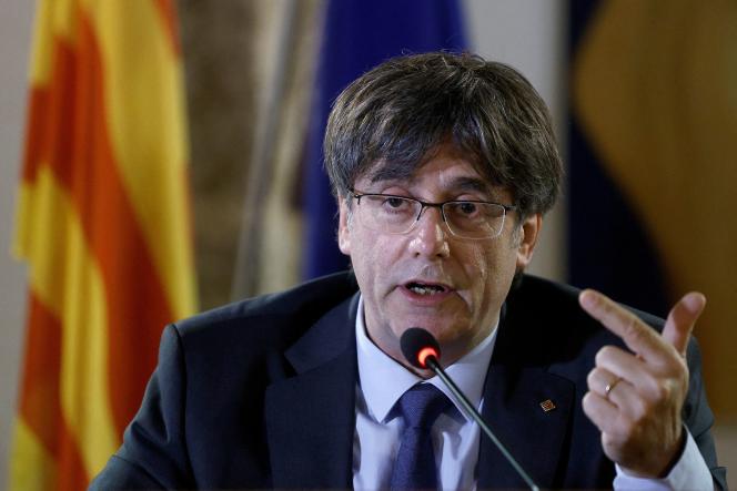 Former President of Catalonia and separatist leader Carles Puigdemont speaks to the press in Alghero, Italy, October 4, 2021.  