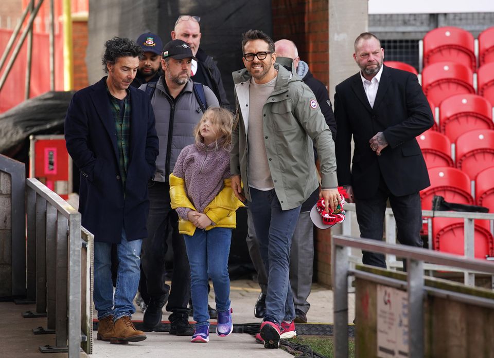 Daughter James accompanied her famous father Ryan Reynolds to his Wales football team's game.