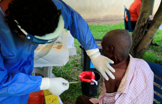 A man gets vaccinated against the Ebola virus, in Kirembo, Uganda, on June 16, 2019. 