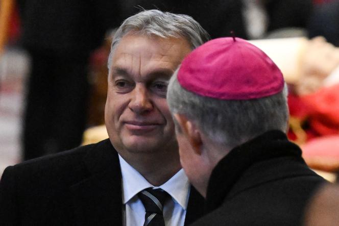 Archbishop Georg Gänswein (from the back in the photo), personal secretary to Benedict XVI, greets Hungarian Prime Minister Viktor Orban at St. Peter's Church in the Vatican on January 3, 2023.