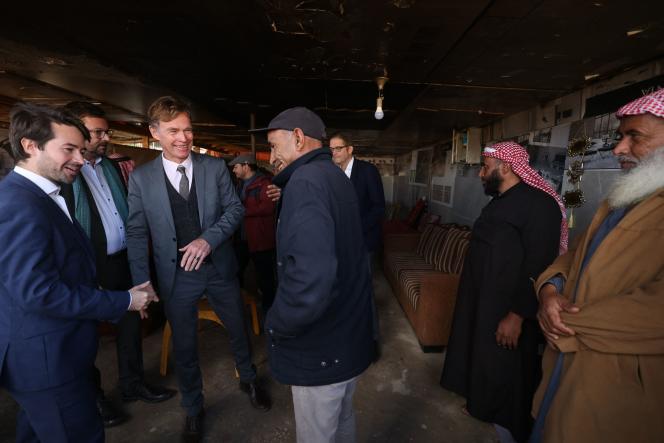 Head of the European Union Mission in the West Bank and Gaza Strip, Sven Kuhn von Burgsdorff (center) greets members of the Bedouin village of Khan Al-Ahmar (West Bank), January 30, 2023.