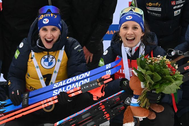 The French Julia Simon (left) and Anaïs Chevalier-Bouchet (right) celebrate their respective first and third places during the mass start event, Sunday January 15, 2023, in Ruhpolding (Germany).