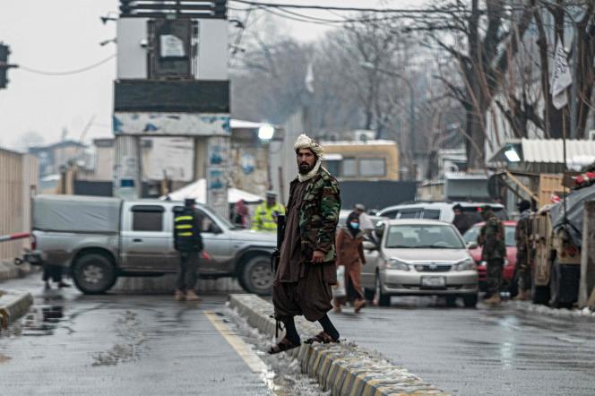 A member of the Taliban security forces stands guard near the Foreign Ministry after a suicide bombing claimed by the Islamic State organization in Kabul on January 11, 2023. 