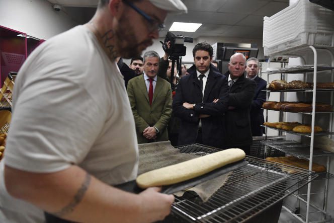 The French Minister Delegate for Public Accounts, Gabriel Attal, at a bakery during a night tour in Brou (Eure-et-Loir), December 1, 2022.