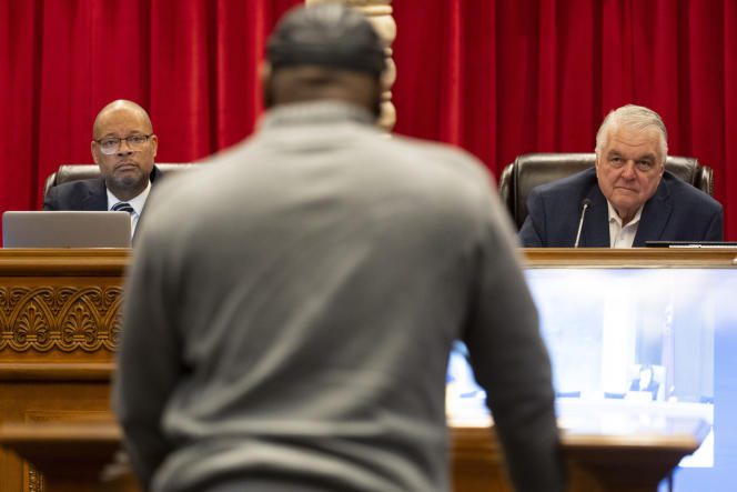 Nevada Attorney General Aaron Ford and Governor Steve Sisolak listen to former death row inmate James Allen speak on behalf of an incarcerated man during a pardons board meeting at the Nevada Supreme Court in Las Vegas , on December 20, 2022.
