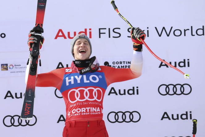 Marco Odermatt celebrates his victory on the podium of the Super-G of the Alpine Skiing World Cup, in Cortina d'Ampezzo, Italy, January 28.