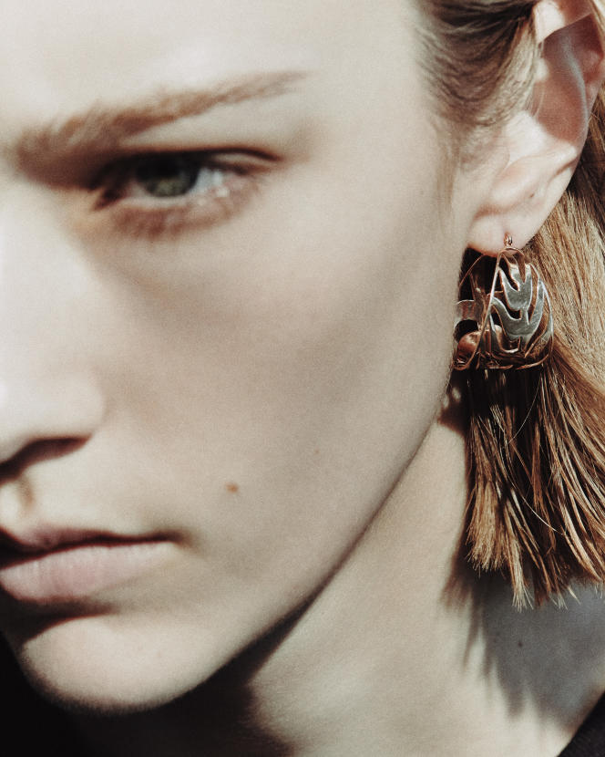 Palm Hoops earring, in gold, Ginette NY, €2,300.  ginette-ny.com