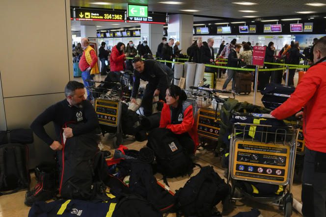 Spanish firefighters prepare to leave for Turkey for an assistance mission after the earthquakes that hit the southeast of the country, in Madrid, on February 6, 2023.