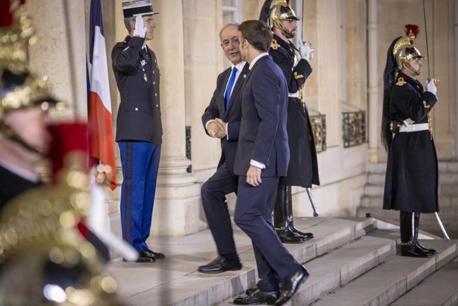 Israeli Prime Minister Benyamin Netanyahu received by Emmanuel Macron at the Elysee Palace on February 2, 2023. 