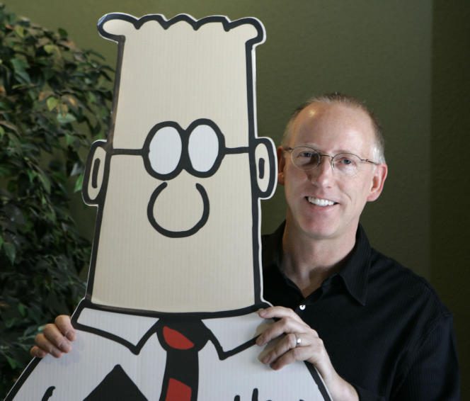 Scott Adams poses with a portrait of the eponymous character from his comic book, 'Dilbert,' October 26, 2006 in California.