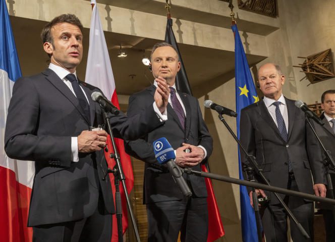 French President Emmanuel Macron, Polish President Andrzej Duda and German Chancellor Olaf Sholz speak to the press at the Security Conference in Munich on February 17, 2023. 