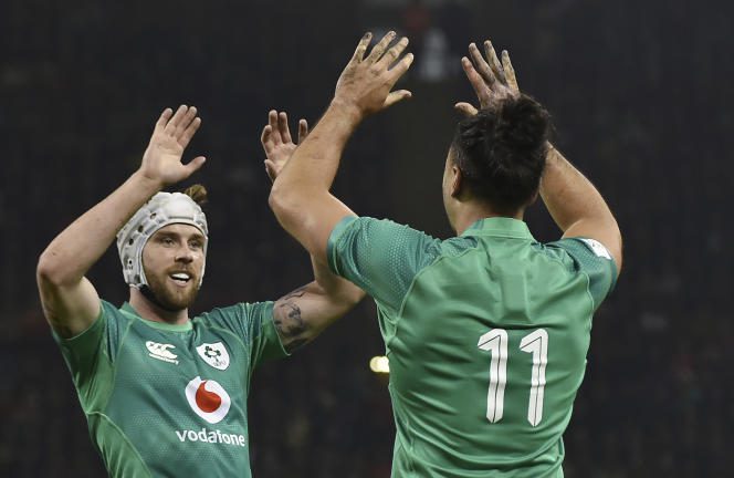 Ireland's Mack Hansen (left) and James Lowe, during the opening match of the Six Nations Tournament against Wales, at the Principality Stadium in Cardiff, February 4, 2023.
