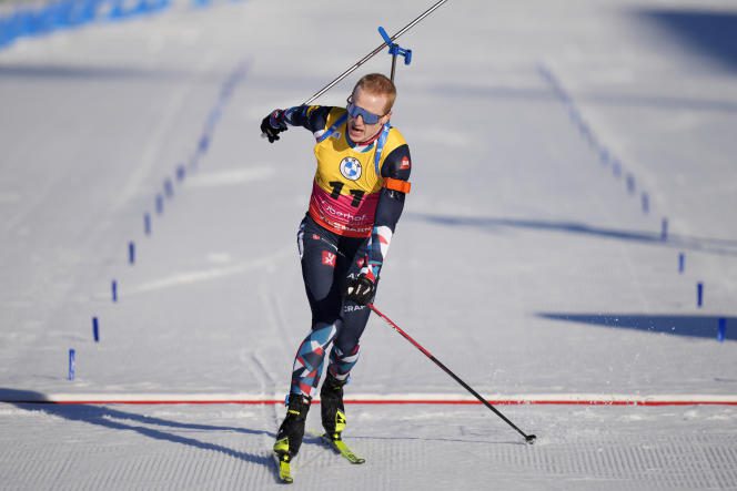 Norwegian Johannes Boe crosses the finish line of the individual biathlon world championships in Oberhof, Germany, on February 14, 2023.