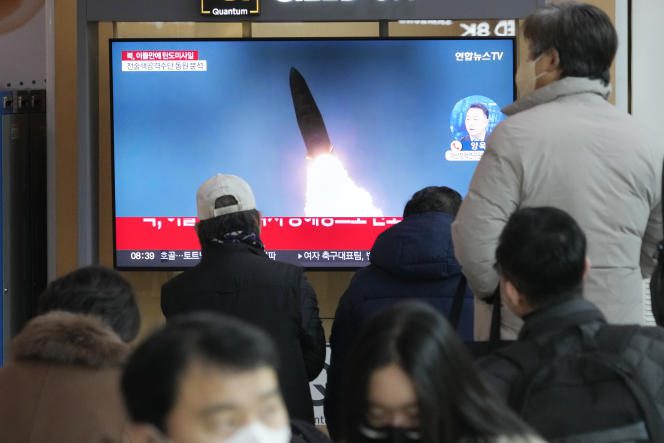 A television screen shows archive footage of North Korea's missile launch during a news program at Seoul Station on February 20, 2023.