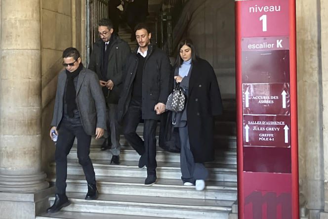 Saad Lamjarred, second from the right, leaves the courthouse in Paris, February 20, 2023.