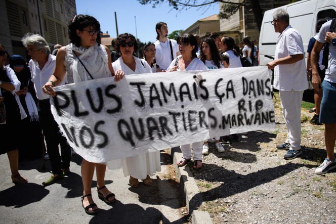 During a commemorative march in tribute to Marwane, 15, shot dead in the street in the district of Grillefeuille affected by drug trafficking, in Arles, July 2, 2022. 