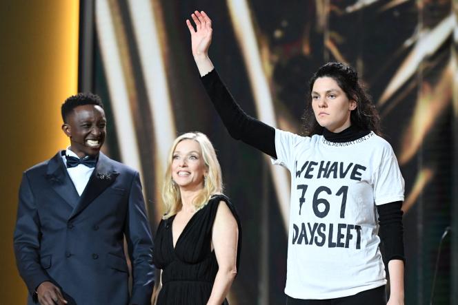 Ahmed Sylla and Léa Drucker on the stage of the Césars, during the irruption of an activist from Last Renovation, in Paris, February 24, 2023.