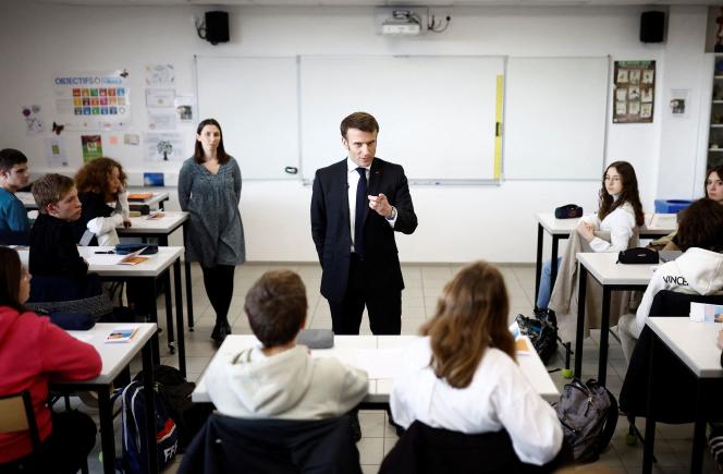 Emmanuel Macron speaks to students from the Jean-Lartaut college, in Jarnac (Charente), on February 28, 2023. 