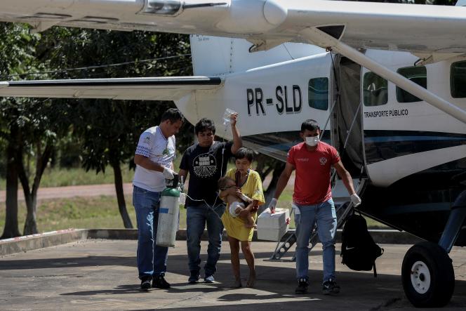 Yanomami indigenous people arrive by plane in Boa Vista, Roraima state, Brazil, for treatment, January 28, 2023.