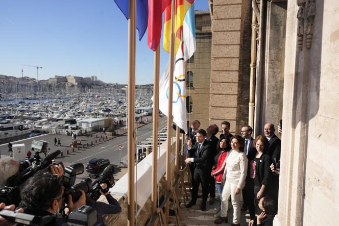Benoit Payan, mayor of Marseille, hoists the Olympic flag at the city hall, in the presence of Tony Estanguet, president of the Paris Olympics Organizing Committee, on February 3, 2023. 