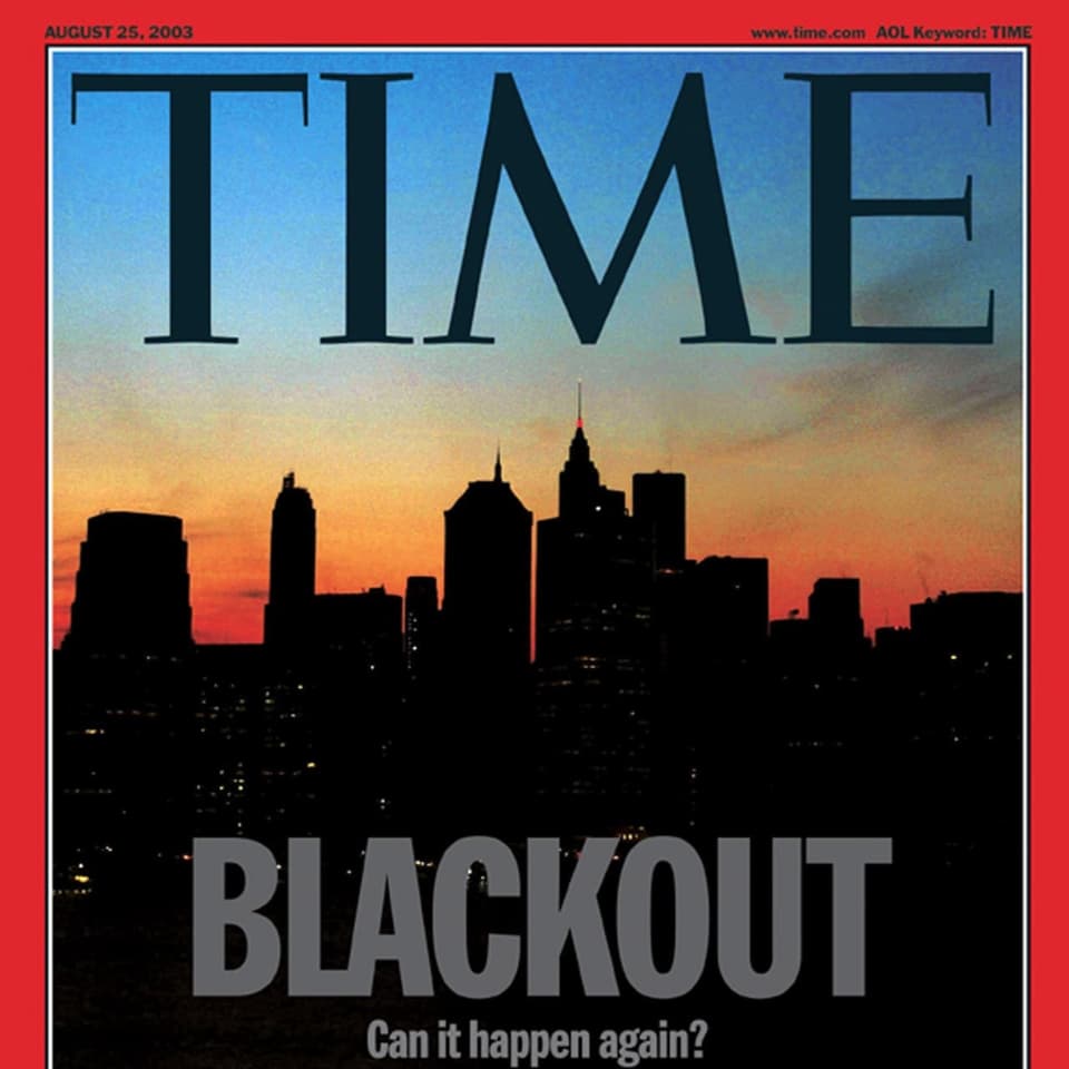 Front cover of Time magazine with a silhouette of a city and the words 