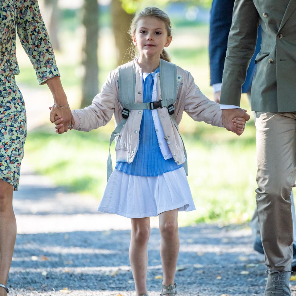 Princess Estelle is at her best on the day she starts school.  She wears a pleated top with a Peter Pan collar and a light white cardigan with her little white skirt.  The schoolgirl look gets cooler with a bomber jacket.